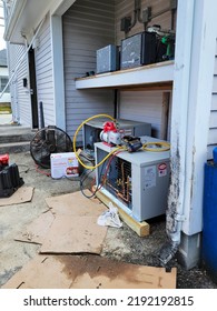 Narraganset, Rhode Island, USA Walk In Freezer Refrigeration Condensing Unit And Evaporator In Shipping Container Being Dropped Off At Location. Mechanical Contractor Installation.