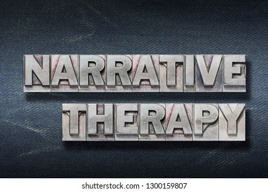 Narrative Therapy Phrase From Metallic Letterpress On Dark Jeans Background