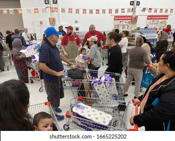 Narre Warren, Victoria - March 6th 2020: Panicked Shoppers Buying Toilet Paper At A Supermarket In Australia During The Corona Covid Pandemic COVID-19