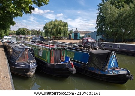 Narrow boats moored at Ely, Cambridgeshire, England on the rive Great Ouse.