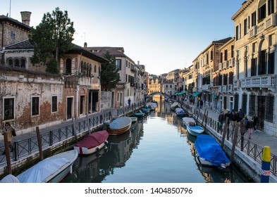 A narrow canal in Venice, Italy  - March 28, 2019