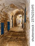 A narrow cobblestone street or alley in the Jewish quarter of Israel