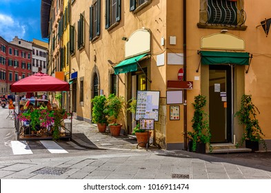 Narrow cozy street in Pisa, Tuscany, Italy. Architecture and landmark of Pisa. Cityscape of Pisa