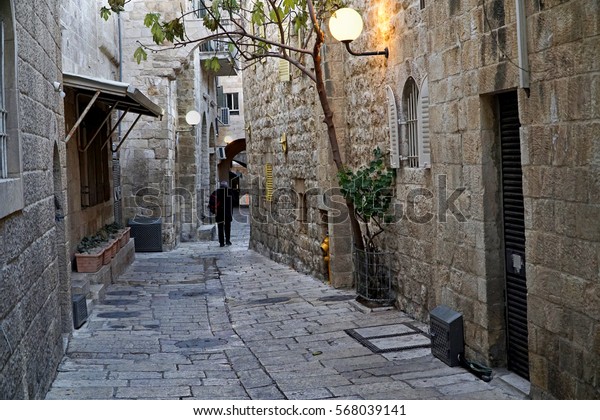 Narrow, dark lanes of the Jewish Quarter of the\
Old City of Jerusalem