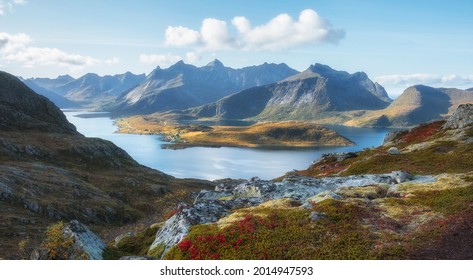 A narrow fjord in the mountains on the Lofoten Islands. Beautiful Autumn in polar Norway