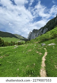 narrow hiking path through the mountains