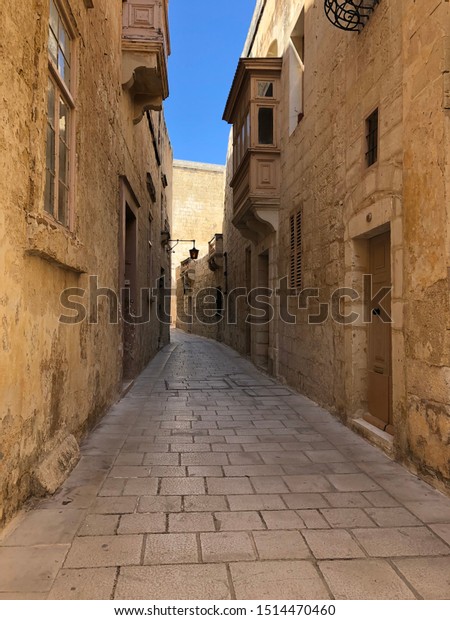 Narrow Medieval Alleyway Stone Buildings Leading Stock Photo Edit Now Narrow Medieval Alleyway Stone Buildings Leading Stock Photo Edit Now