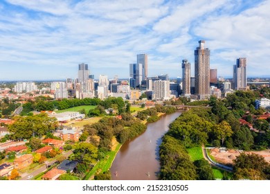 Narrow Parramatta river in Western Sydney Parramatta CBD council - aerial cityscape to high-rise urban towers.