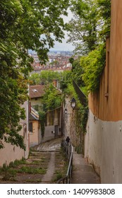 Narrow stairway in Old Town Lyon framed by trees
