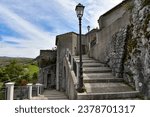 A narrow street in Castelgrande, a rural village in the province of Potenza in Basilicata, Italy.	