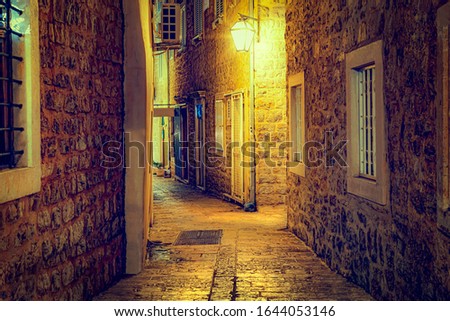 Narrow street in the evening in the old town of Budva. Montenegro