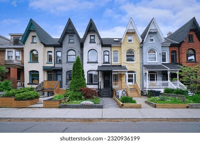 Narrow Victorian row houses with peaked gables - Powered by Shutterstock