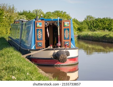 Narrowboat Painted With Roses And Castles Moored On The Shropshire Union Canal At Nantwich