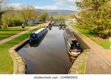 Narrowboats moored up on the Llangollen canal in the Trevor Basin at the Froncysyllte aqueduct on the inland waterway netwrok in North Wales UK