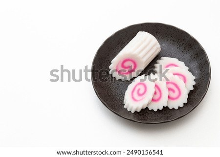 Naruto rolls on white background.