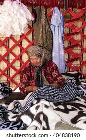 Naryn, Kyrgyzstan - 10 July 2008 : Unidentified Kyrgyz Stitching  A Wool Carpet Used To Build Yurt, A Traditional Nomadic House. 