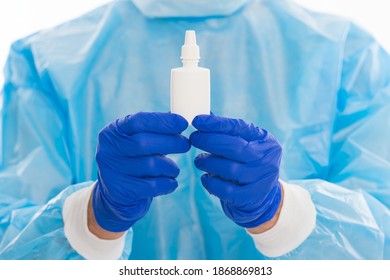 Nasal Drops In Hands Of Doctor. First Symptoms Of Virus. Treat Runny Nose With Nasal Spray. Free Your Stuffy Nose. No Addiction To Medicals. Drug Store. Coronavirus Covid Pandemic. Nurse In Gloves.