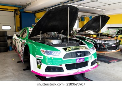 Nascar Cars With Open Hood Aligned In Workshop. Vallelunga, Italy, October 29 2021. American Festival Of Rome