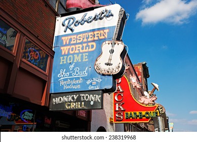 NASHVILLE - MARCH 23: Robert's Western World And Jacks Bar-B-Que Sign On Lower Broadway Area On March 23, 2014 In Nashville, Tennessee, USA.  These Restaurants Are Local Food Landmarks.