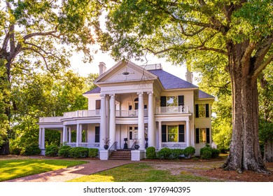 Nashville, North Carolina USA-05 20 2021: The Bissette-Cooley House is a Large White Plantation Style House in Nashville.