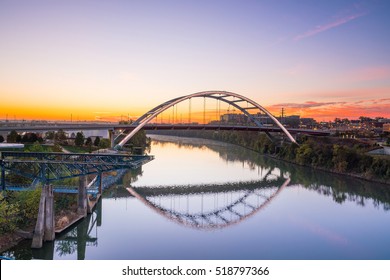 Nashville, Tennessee downtown skyline with Cumberland River in USA - Powered by Shutterstock