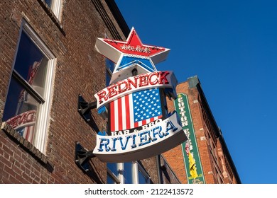 Nashville, Tennessee - January 10, 2022: Neon Sign For Country Music Star John Rich, Of Big And Rich, Redneck-Riveria Bar And BBQ Restaurant