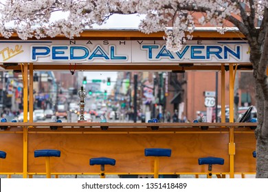 Nashville, Tennessee - March 25, 2019 : A Pedal Tavern Party Bike On A Beautiful Sunny Day. View Of Broadway Behind The Bike.  