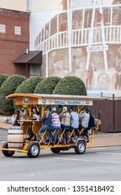 Nashville, Tennessee - March 25, 2019 : A Pedal Tavern Party Bike On A Beautiful Sunny Day Crossing Broadway. 