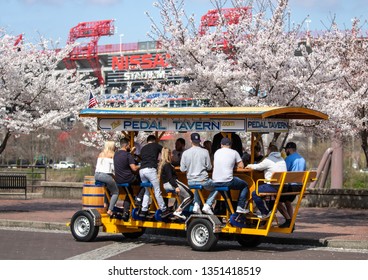 Nashville, Tennessee - March 25, 2019 : A Pedal Tavern Party Bike On A Beautiful Sunny Day At The Beginning Of Broadway, With Nissan Stadium In The Background. 