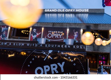 NASHVILLE, TN, USA - February 27, 2018: The Grand Ole Opry Is One Of The Most Famous Music Venues Since Being Created In 1925. The Area Around It Is Filled With Guitars, A Food Truck And Seating.