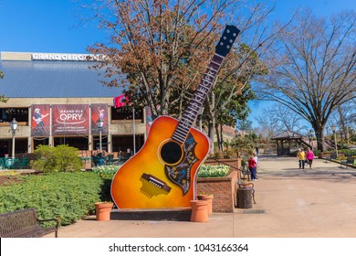 NASHVILLE, TN, USA - February 27, 2018: The Grand Ole Opry Is One Of The Most Famous Music Venues Since Being Created In 1925. The Area Around It Is Filled With Guitars, A Food Truck And Seating.