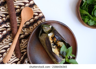 Nasi Bakar Or Grilled Rice Toasted Rice Wrapped In Banana Leaf,   And Placed On A Batik Cloth. Indonesian Traditional Food. Top View. Food Photography. 