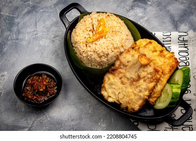 Nasi Cikur, Fried Rice Seasoned With Kencur (aromatic Ginger) Served With Tempeh And Chili. One Of The Traditional Foods From West Java, Indonesia