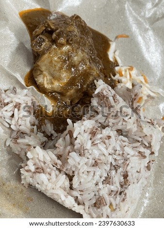 Nasi dagang with chicken curry in selective focus. Zdjęcia stock © 