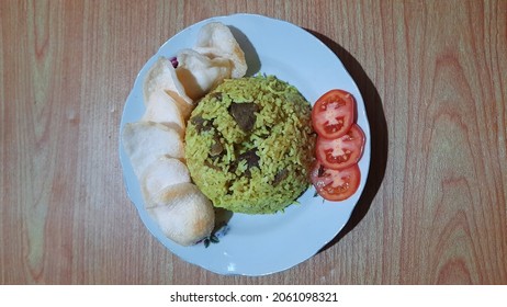 Nasi Kebuli Is A Savory Spiced Rice Dish Found In Indonesia.