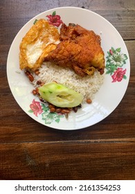 Nasi Lemak, A Malay Style Complete Meal Of Fragrant Rice Cooked In Coconut Milk.