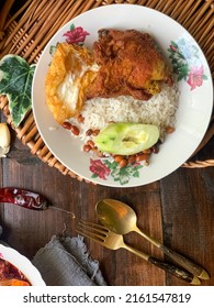 Nasi Lemak, A Malay Style Complete Meal Of Fragrant Rice Cooked In Coconut Milk.