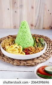 Nasi Tumpeng Pandan Is Dome Shape Pandan Green Rice With Various Side Dish.