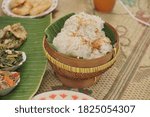 Nasi Uduk Betawi. Coconut flavored steamed rice dish from Betawi, Jakarta. Nasi Uduk. Coconut flavor steamed rice. Plated in an earthenware pot lined with banana leaf. Sprinkled with fried shallot.