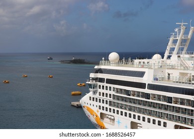 Nassau Bahamas 12 February 2020: Large Cruise Ship Moored In Port With Small Lifeboats Carrying Out Safety Drill In Water