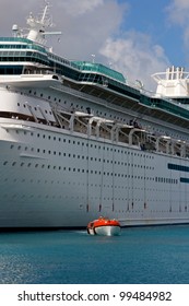 NASSAU, BAHAMAS - MARCH 25: Modern Cruise Ship Deploys Lifeboats During A Safety Drill On March 25, 2012 In Nassau, Bahamas. Recent Incidents Have Led To An Increase Of Safety Awareness Aboard.