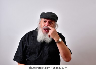 Nasty Old Man Picking His Nose
Elderly Gentleman Sticks A Finger Up His Nose
Senior Man Digging For Nose Gold
