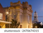 Natchez, Mississippi, USA - April 21, 2024: Twilight light descends on a quiet downtown Natchez landscape.