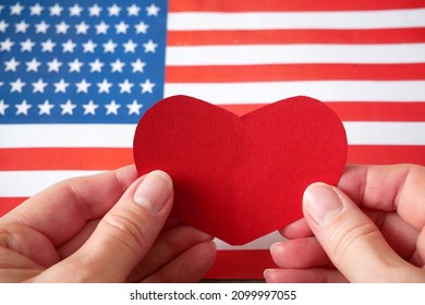 National American Flag And Heart. American Heart Month In February, Closeup