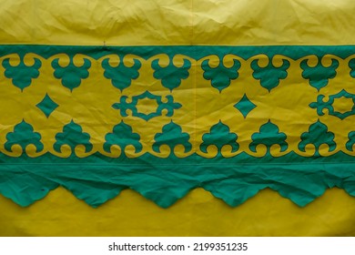 National Bashkir pattern green on yellow fabric