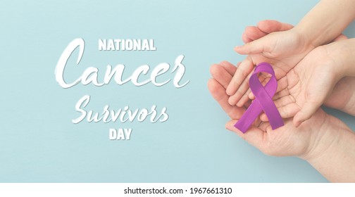 National Cancer Survivors Day. Adult and child hands holding purple ribbon on blue background. Alzheimer's disease, Pancreatic cancer, Epilepsy, Hodgkin's Lymphoma awareness. Banner - Shutterstock ID 1967661310