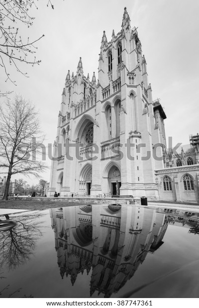 National Cathedral and reflection on a car top -\
Washington DC USA