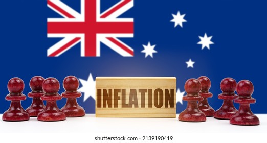 National Concept. Against The Background Of The Flag Of Australia, Pawns And A Sign With The Inscription - Inflation