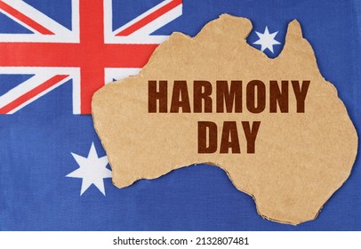 National Concept Of Australia. On The Flag Of Australia Lies The Contour Of The Map Of The Country With The Inscription - Harmony Day