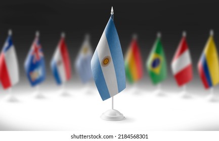 The national flag of the Argentina on the background of flags of other countries